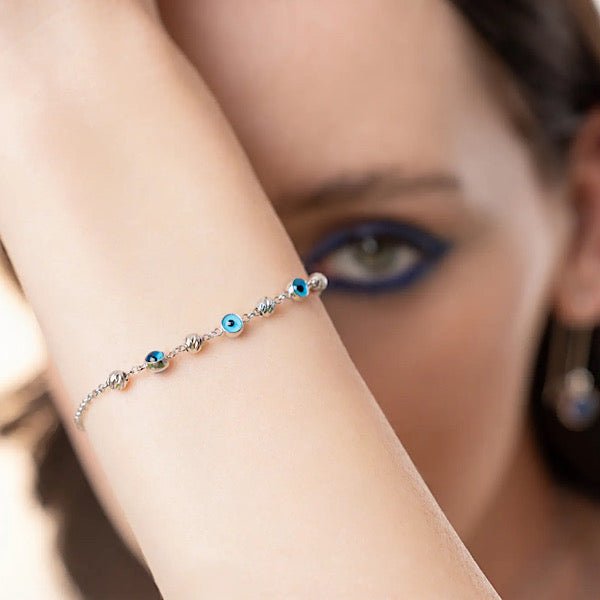 Evil eye diamond cut ball bracelet in sterling silver - Zehrai